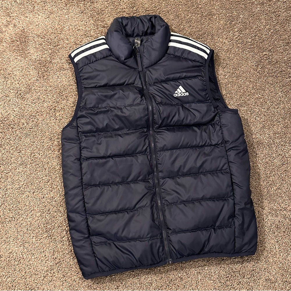 Adidas navy blue puffer vest, size small.